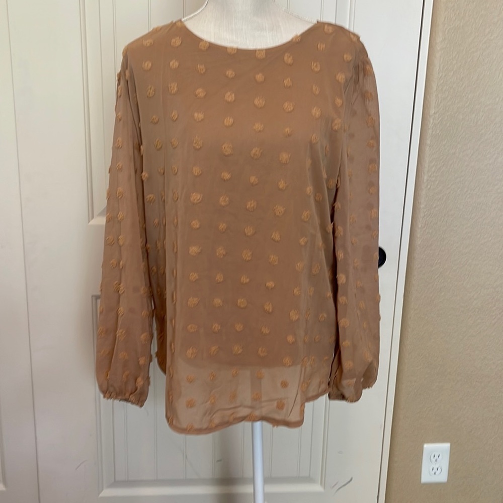 Qearal Bouse, never worn. Size L.